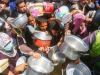 UNRWA People clamour for food in Gaza